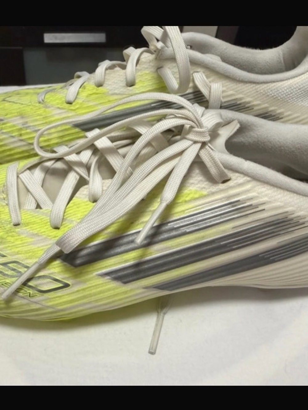 Adiddas  F150 White & Neon Yellow Athletic Sneakers with Silver Accents